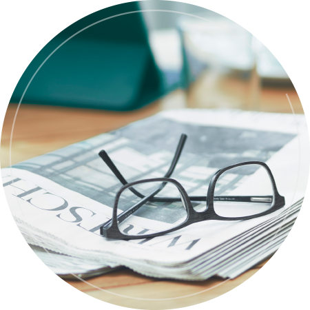 Zeitung und Brille - öffentliche Aufträge vergeben mit evergabe.de